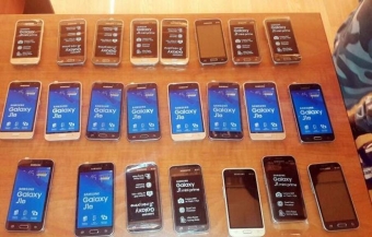 Keçmiş məhkum mağazadan pul və telefon oğurladı