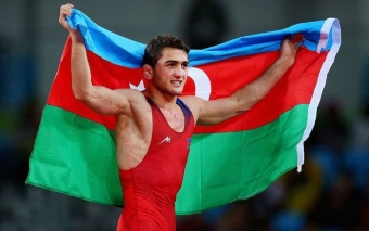 General üçqat dünya çempionunun hərbi rütbəsini artırdı