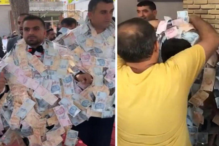 Toyda o qədər pul yığıldı ki, 4 nəfər güclə daşıdı - VİDEO 