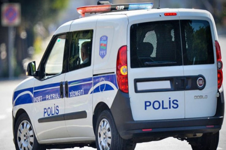 Polis maşınının şüşəsini sındıran qadın cəzalandırıldı 