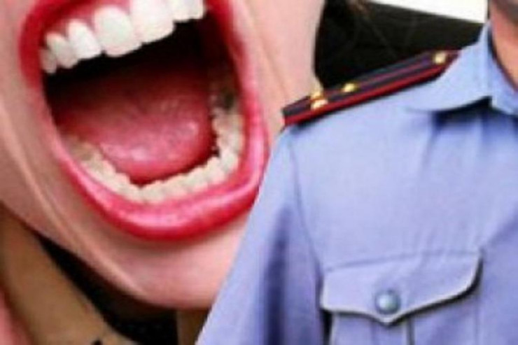 60 yaşlı qadın oğluna görə polisi dişlədi 